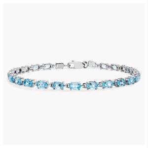 Petite Swiss Blue Topaz Oval Bracelet In Sterling Silver (5x3mm)